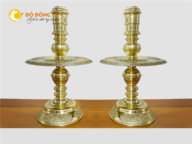 Giá bán đôi chân nến chạm rồng phượng bằng đồng vàng