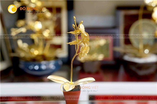 Biểu trưng nhành hoa lan hồ điệp mạ vàng tinh xảo